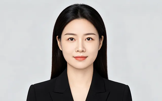 Ms. Li Xue, After-Sales and SOP Specialist, reviewing installation documentation